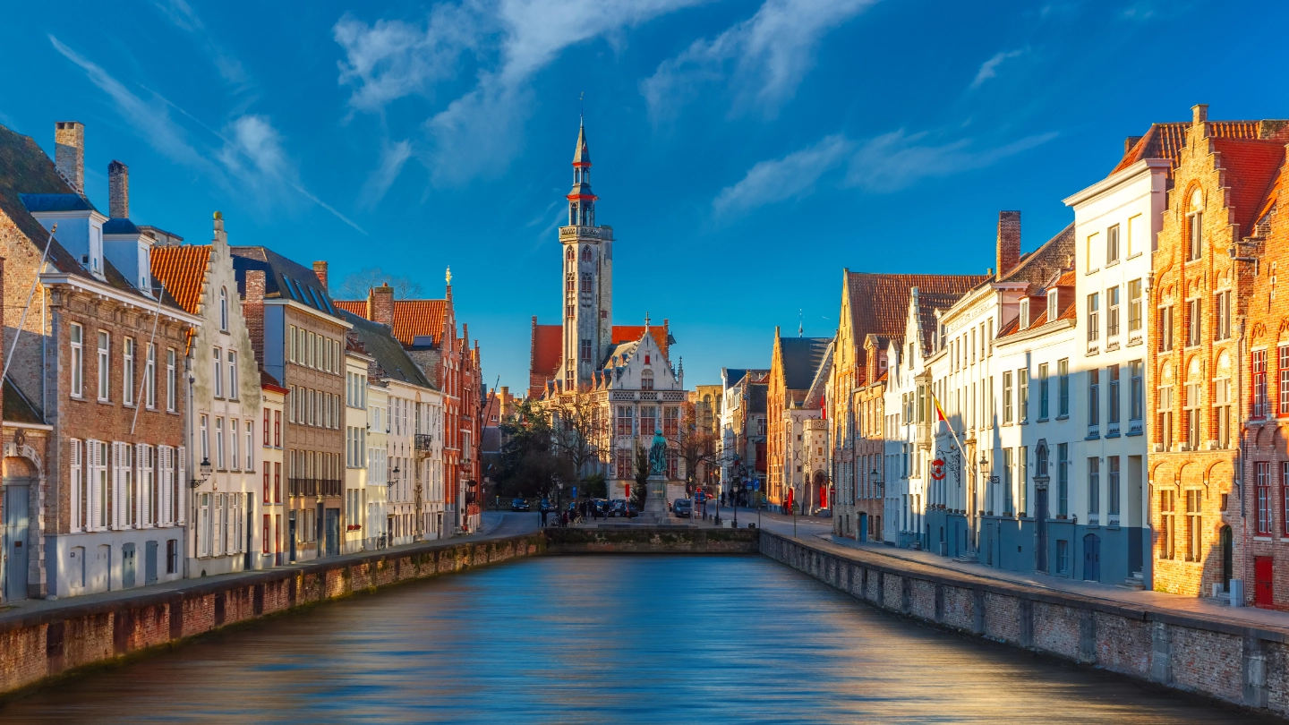 Spiegelrei canal and Jan Van Eyck Square in the morning in Bruges, Belgium Spiegelrei canal and Jan Van Eyck Square in the morning in Bruges, Belgium